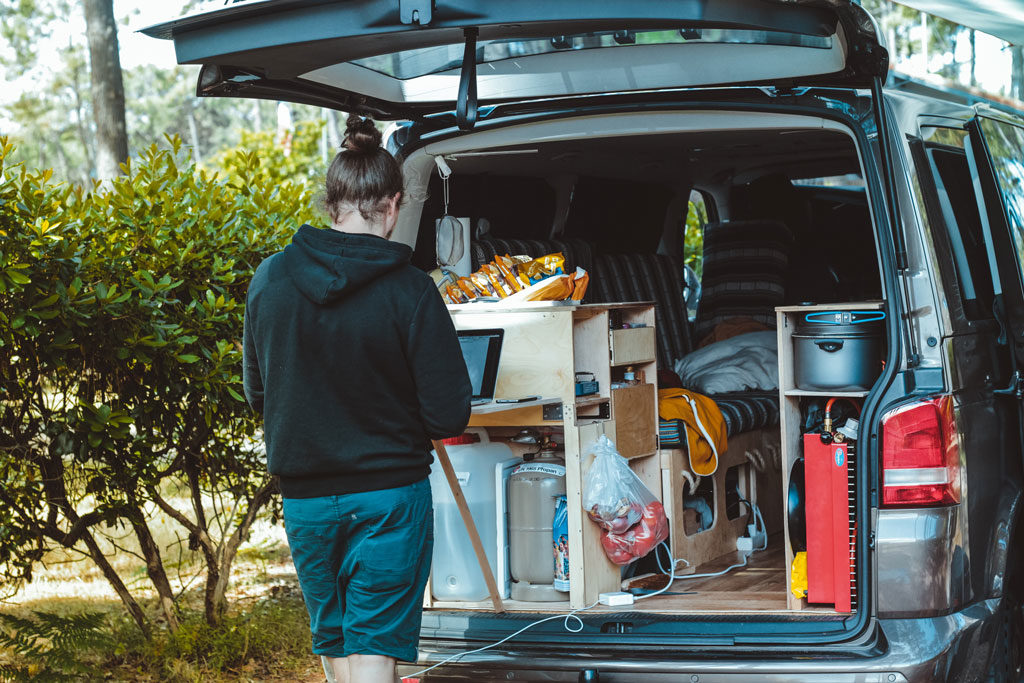 A car converted into camping car to sleep inside.